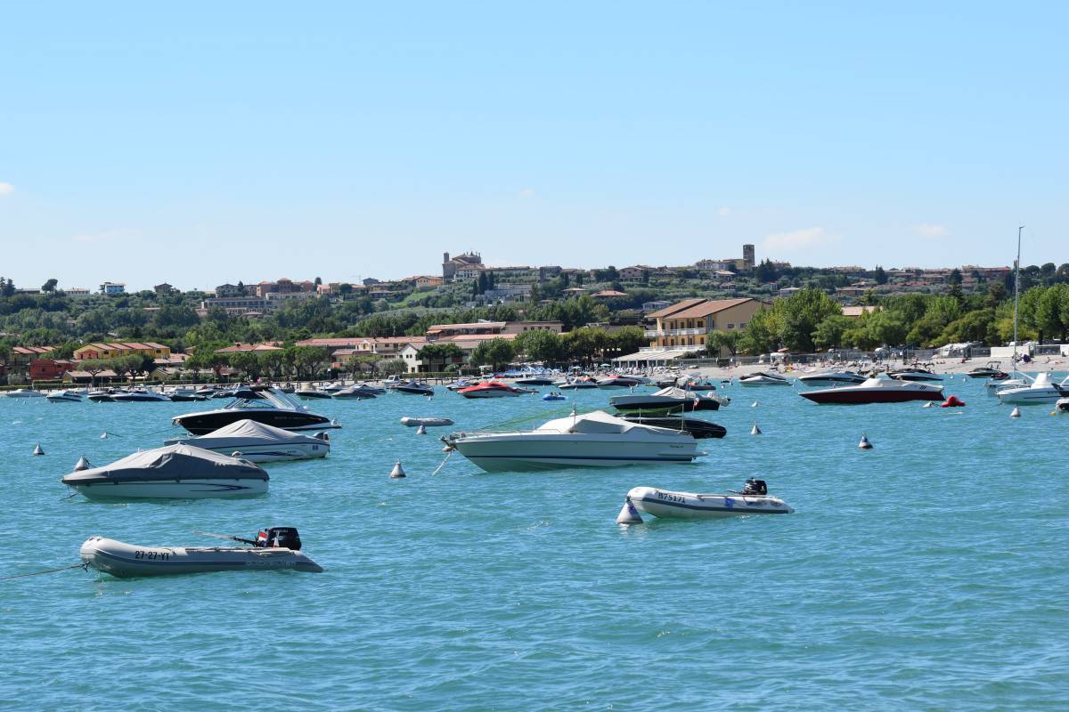 Harbour with moored boats on Lake Garda